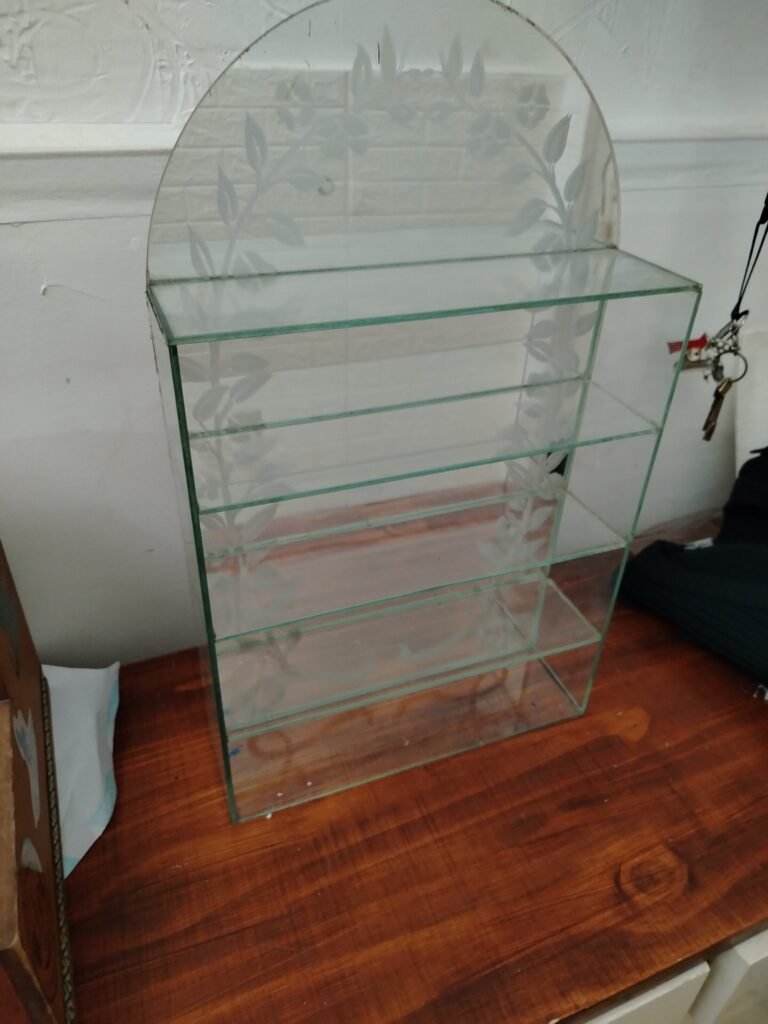 Repisa de vidrio espejada